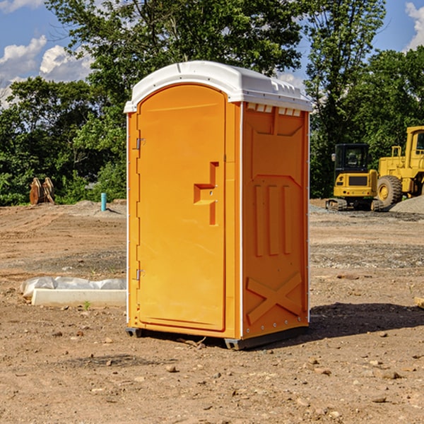 how often are the porta potties cleaned and serviced during a rental period in Woodman WI